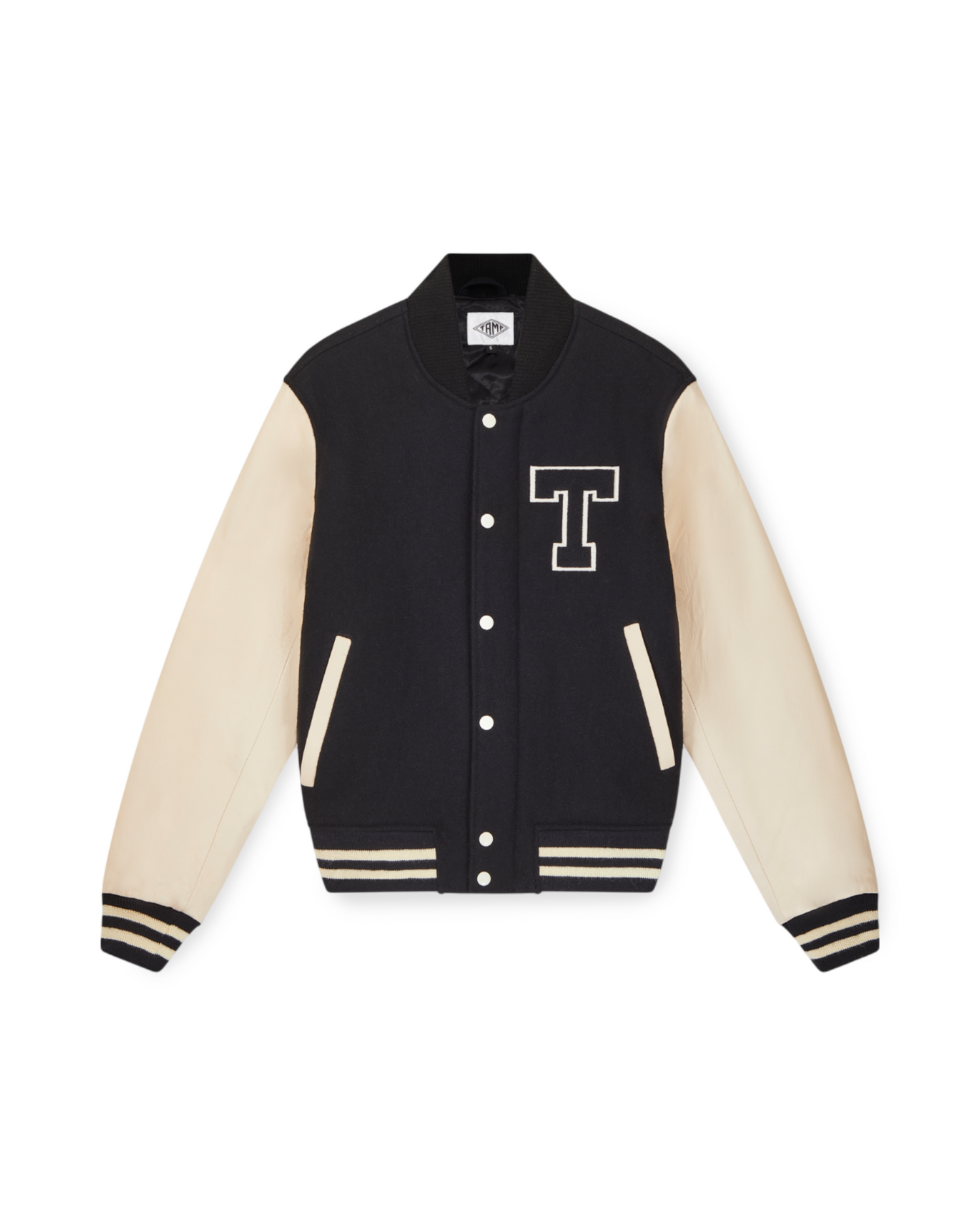 Front view of a black and cream varsity jacket made of leather and wool, featuring an embroidered 'T' on the left side and cream stripes on the wrists and waist, set against a white background.